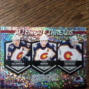 2023-24 UD MVP Alternate threads Nathan MacKinnon. Cale Makar, Alexandar Georgiev