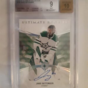 2020-21 Ultimate Collection Ultimate Rookies 208/299 Jake Oettinger GRADED 9 (9.4)