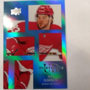 2024-25 UD series 2 portraits Alex DeBrincat